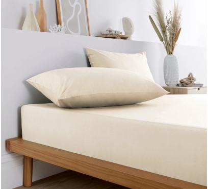 Jemně žluté jersey prostěradlo s lycrou